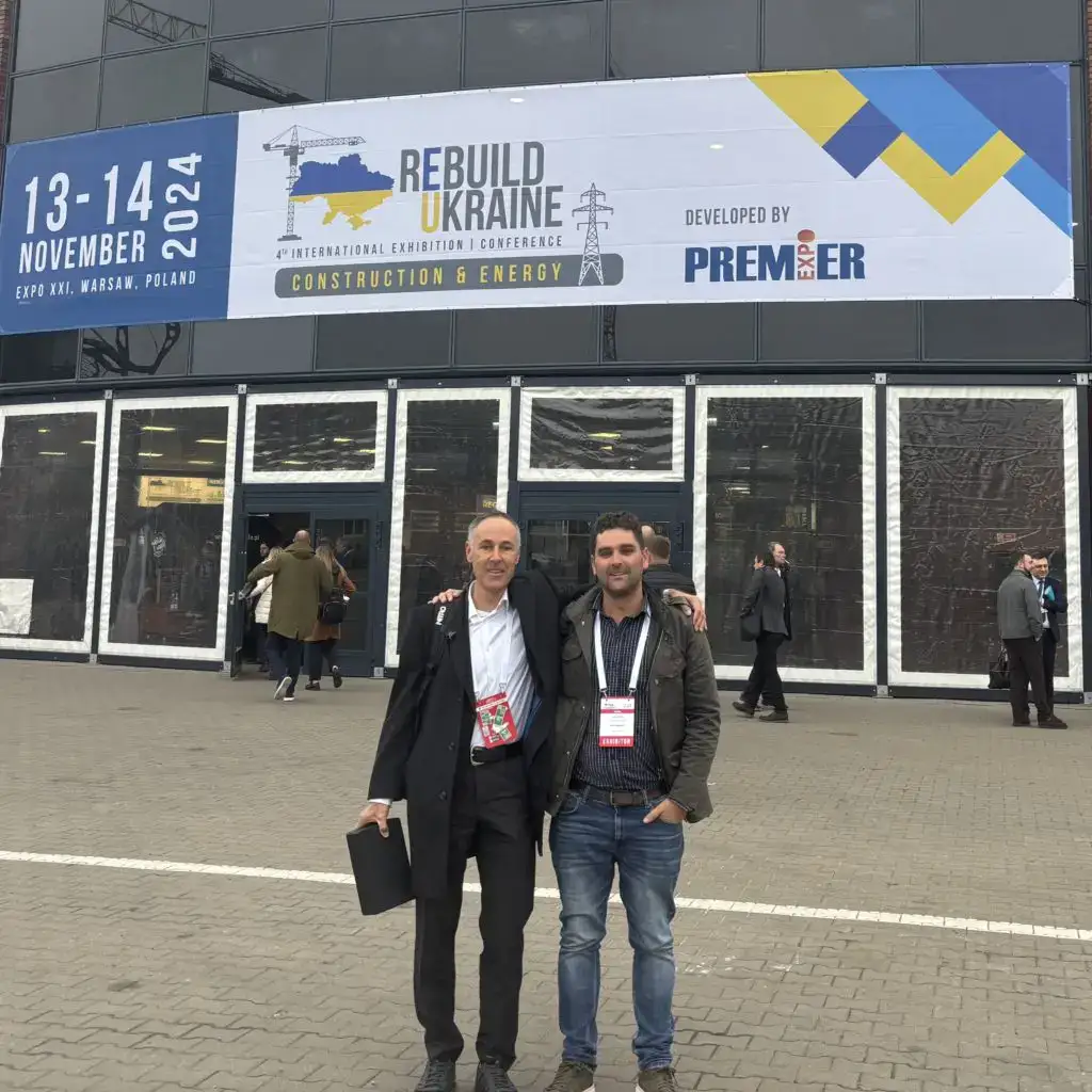 Modern conference attendees at Rebuild Ukraine Expo in Warsaw, Poland.
