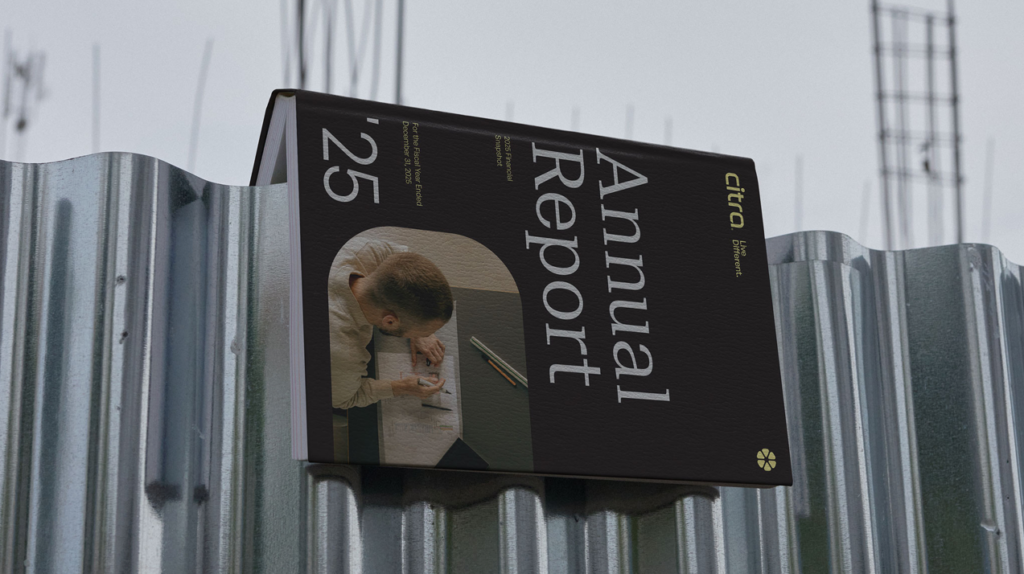Citra’s updated branding on an annual report book, highlighting the new logo and emblem.