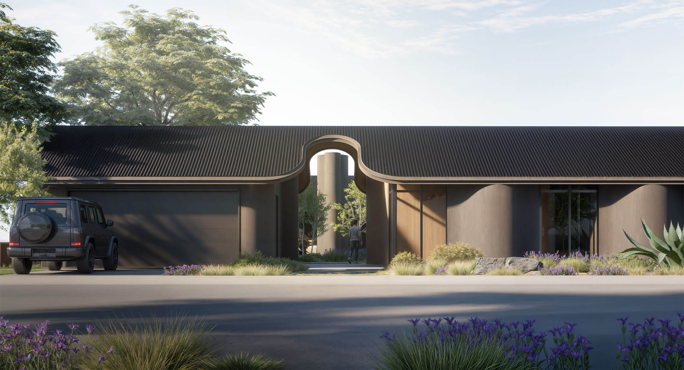 Modern house with dark corrugated roof, curved walls, and archway entrance. A dark SUV is parked, a person walks to the door.