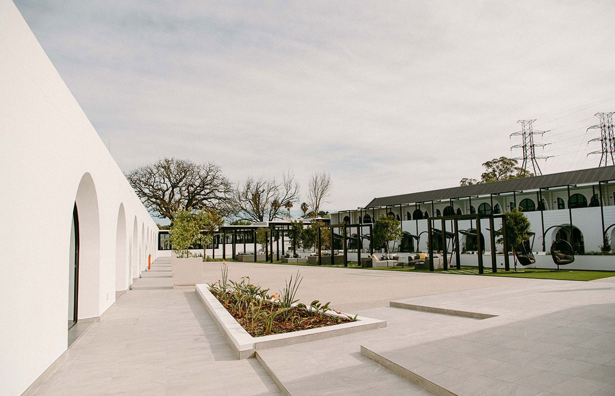 Contemporary architectural exterior with clean lines and open space at Citra.